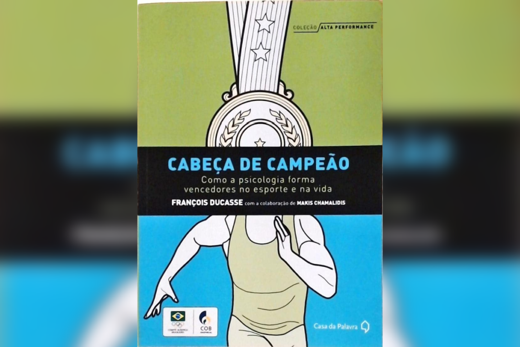 Capa do livro “Cabeça de Campeão”, com ilustração de atleta e medalha, fundo verde e azul